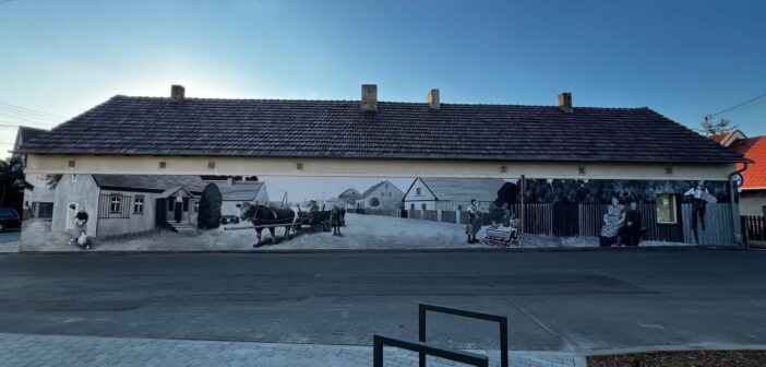 Kiedy ściana zaczyna pamiętać. W Dobrzeniu Wielkim Murki namalowały sto lat historii